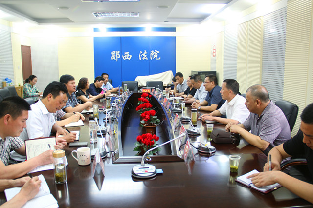 白河法院院长到郧西法院交流工作.jpg